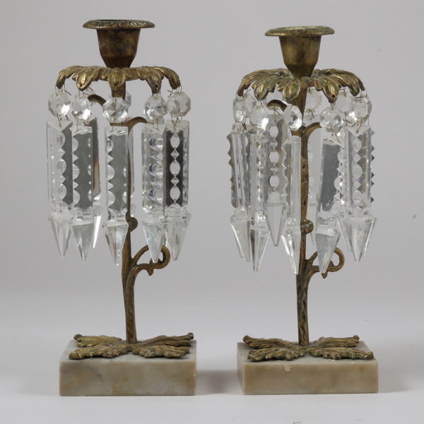 LJUSSTAKAR, ett par, 1900-talets första hälft