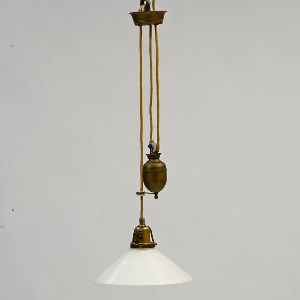 SKOMAKARLAMPA, 1900-talets första hälft