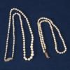 Pärlcollier, 2 st, med silverlås, längd 44 resp 60 cm